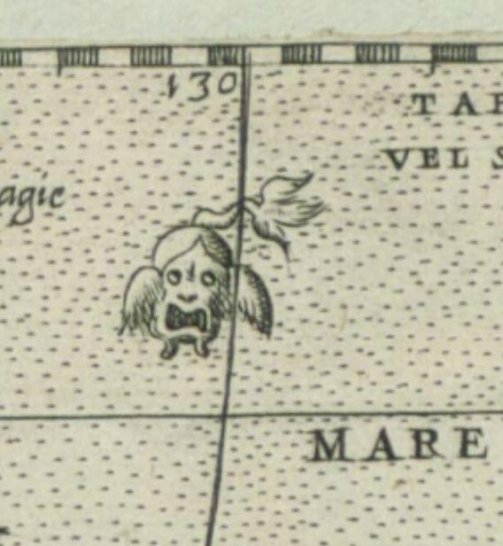 A face screaming, like an apple with wings as ears, and a tail, and this nice little fella is part of a map.