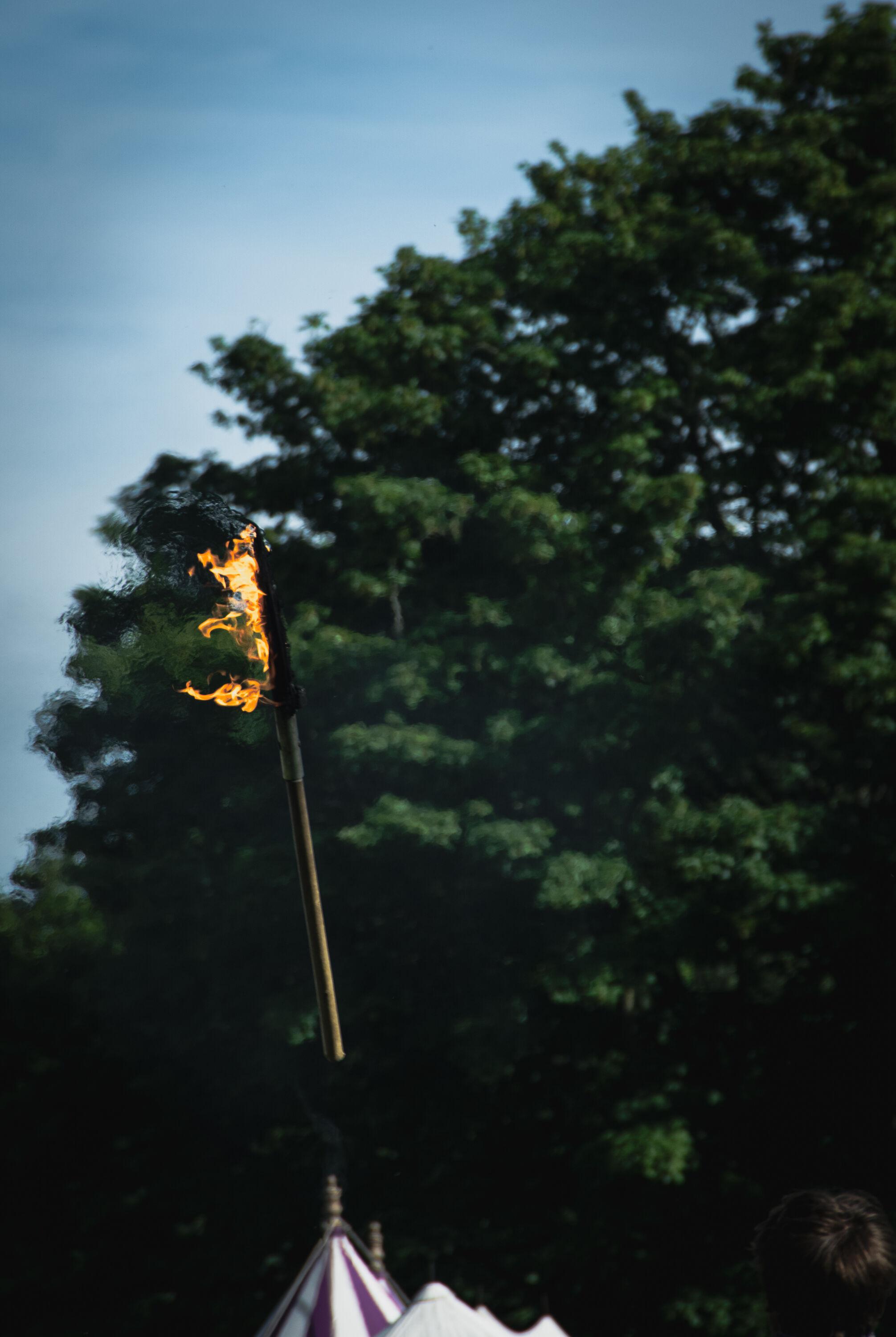 At the show, a fire-lit axe was thrown up in the air.